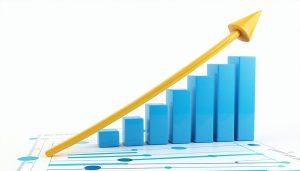Rising bar graph with yellow arrow indicating growth.
